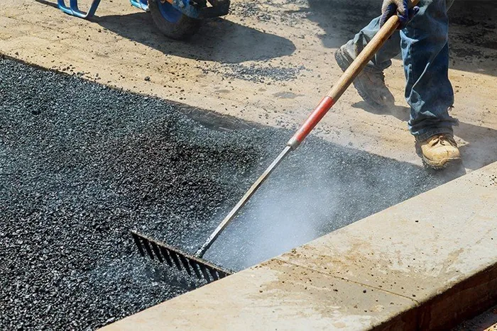 Travaux de pavage et finition de l’asphalte